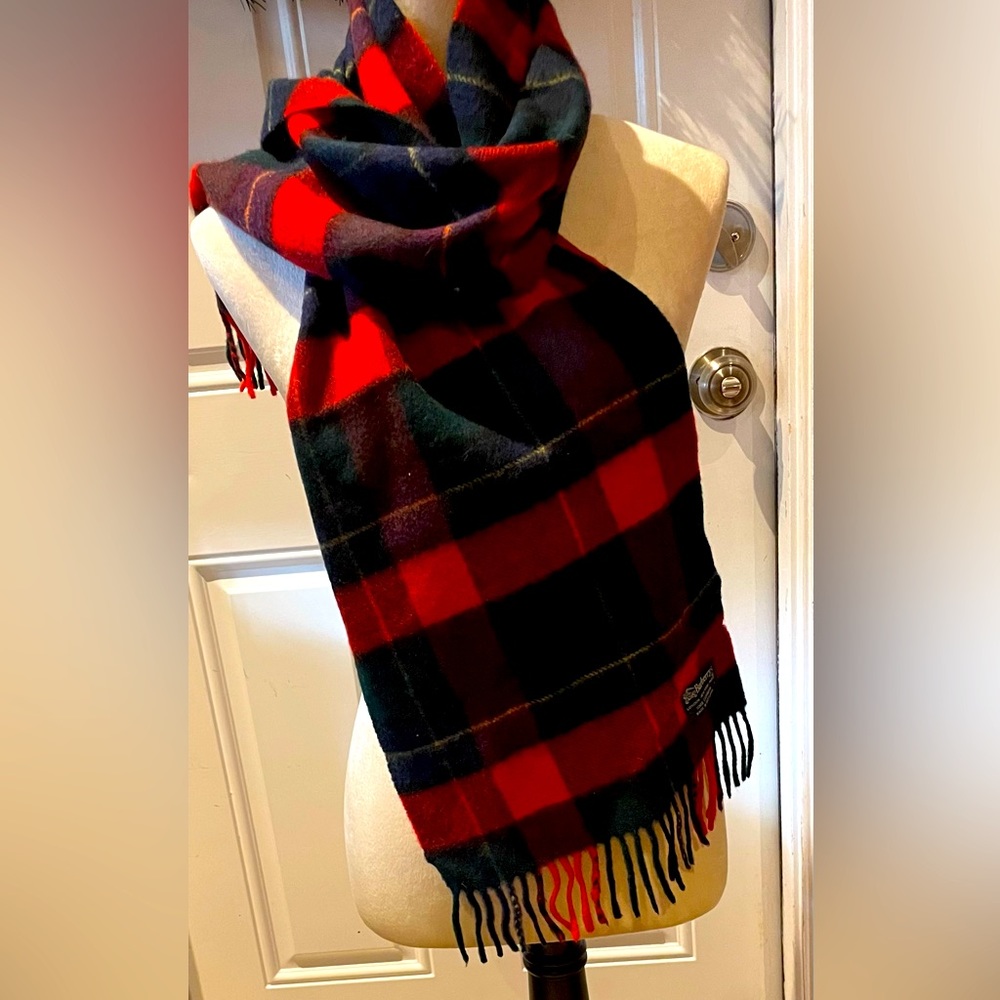This cashmere Burberry scarf was bought as a gift.(unused)60”w/fringe 54”w/o